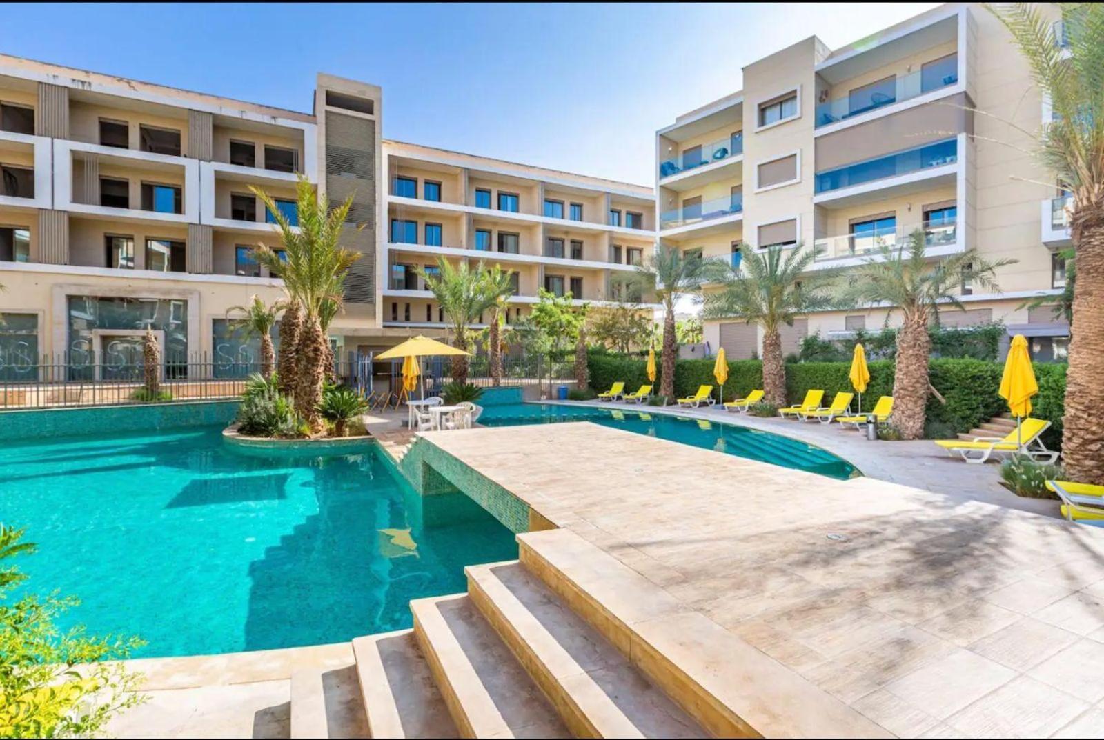 Appartement Luxueux Avec Piscine 10 Minutes Du Centre Ville Marrakesh Eksteriør billede