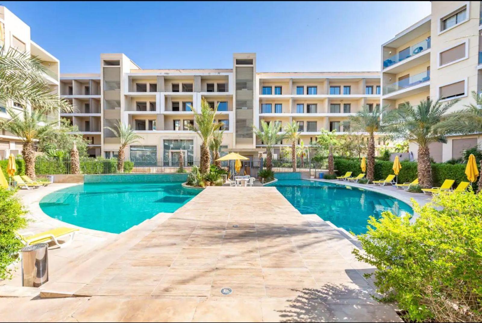 Appartement Luxueux Avec Piscine 10 Minutes Du Centre Ville Marrakesh Eksteriør billede